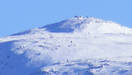 Snow-covered summit of Scafell Pike