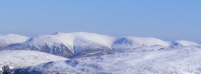 Distant view of snowy Helvellyn